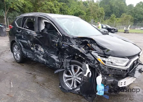 2020 Honda Cr-V Hybrid Touring z USA, uszkodzony, nr VIN 7FART6H95LE004172